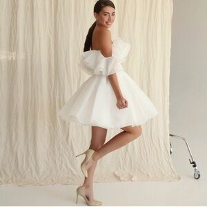 White bridal shower dress. Fit and flare, off the shoulder, corset tie up back.